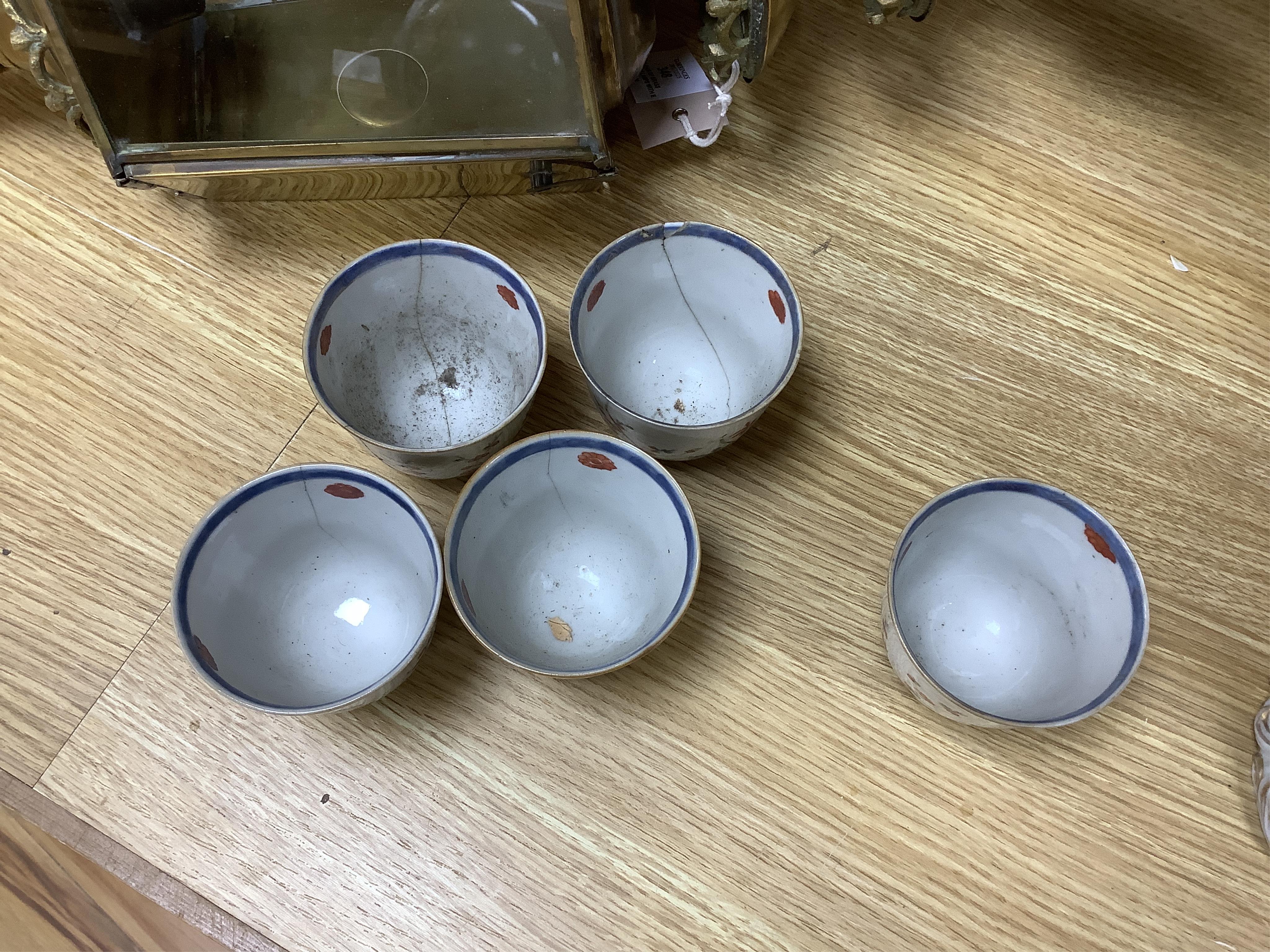 A group of 18th century Chinese export porcelain tea and coffee ware, including Mandarin pattern teapot and cover, two coffee cups and saucers, a blue and white teapot and cover various famille rose coffee cups, etc.